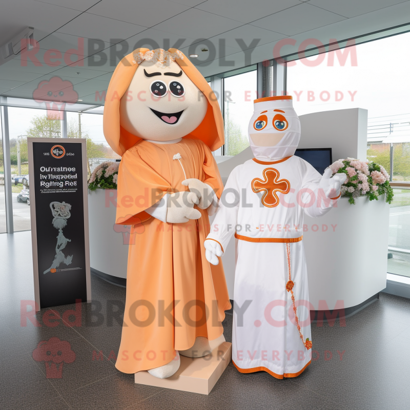 Peach Celtic Cross mascot costume character dressed with a Wedding Dress and Ties Peach Celtic Cross mascot costume character dressed with a Wedding Dress and Ties