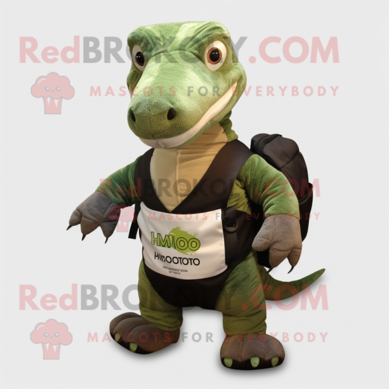 Forest Green Komodo Dragon mascot costume character dressed with a Oxford Shirt and Messenger bags