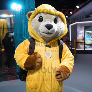 Yellow Otter mascot costume character dressed with a Parka and Necklaces