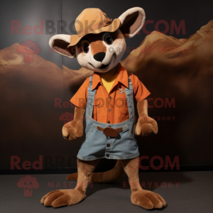 Rust Kangaroo mascot costume character dressed with a Boyfriend Jeans and Hat pins