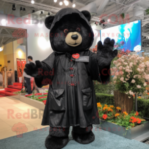 Black Teddy Bear mascot costume character dressed with a Raincoat and Keychains