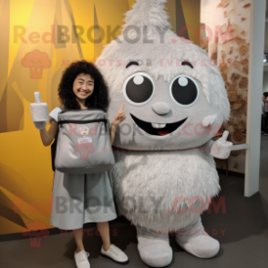 Silver Fried Rice mascot costume character dressed with a Midi Dress and Backpacks