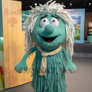 Teal Pesto Pasta mascot costume character dressed with a Board Shorts and Hair clips