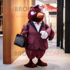 Maroon Pigeon mascot costume character dressed with a Suit Jacket and Clutch bags