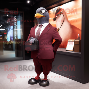 Maroon Pigeon mascot costume character dressed with a Suit Jacket and Clutch bags