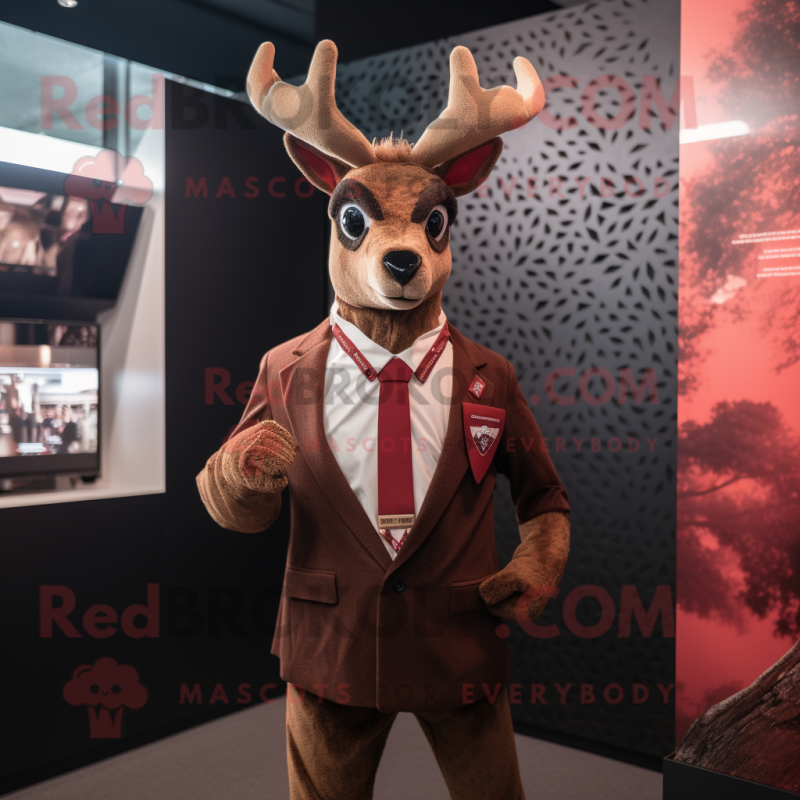Red Deer mascot costume character dressed with a Suit Jacket and Headbands Red Deer mascot costume character dressed with a Suit Jacket and Headbands