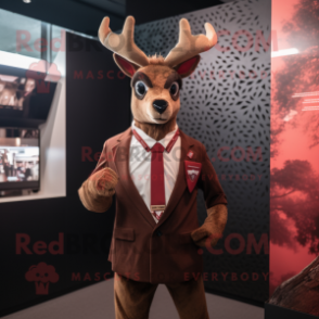 Red Deer mascot costume character dressed with a Suit Jacket and Headbands