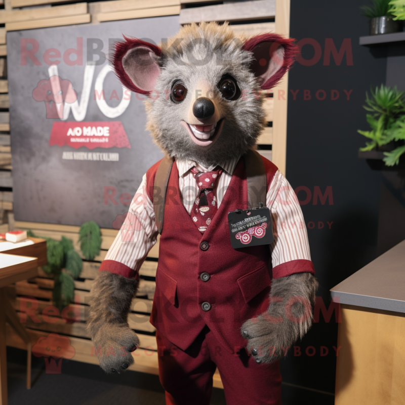 Maroon Aye-Aye mascot costume character dressed with a Blazer and Suspenders