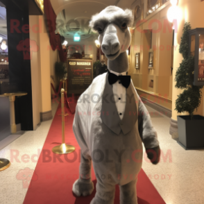 Gray Camel mascot costume character dressed with a Evening Gown and Bow ties