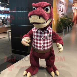 Maroon Iguanodon mascot costume character dressed with a Flannel Shirt and Clutch bags