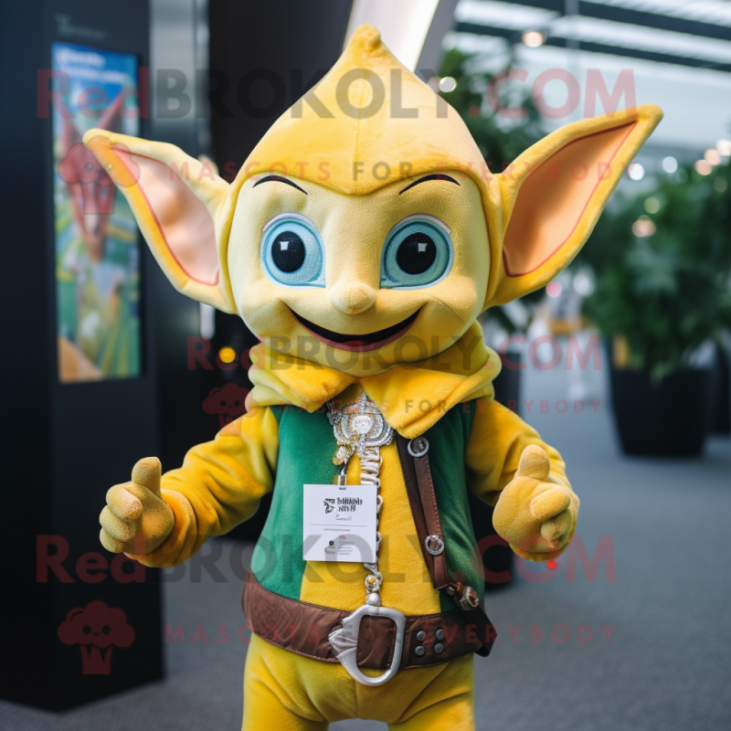 Yellow Elf mascot costume character dressed with a Jacket and Keychains Yellow Elf mascot costume character dressed with a Jacket and Keychains