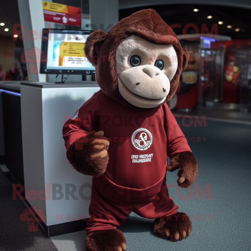 Maroon Monkey mascot costume character dressed with a Sweatshirt and Scarf clips Maroon Monkey mascot costume character dressed with a Sweatshirt and Scarf clips