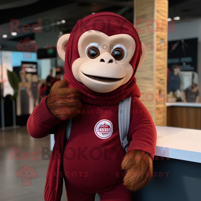 Maroon Monkey mascot costume character dressed with a Sweatshirt and Scarf clips Maroon Monkey mascot costume character dressed with a Sweatshirt and Scarf clips