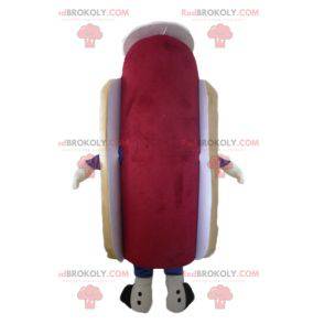 Leuke en kleurrijke gigantische hotdogmascotte met een hoed -