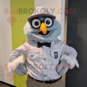 Gray Chicken mascot costume character dressed with a Button-Up Shirt and Smartwatches