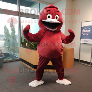 Maroon Salmon mascot costume character dressed with a Yoga Pants and Berets