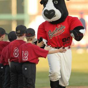 Black and white bull buffalo mascot in baseball outfit -