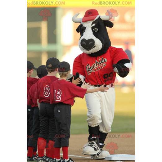 Zwart-witte buffelstier mascotte in honkbal outfit -