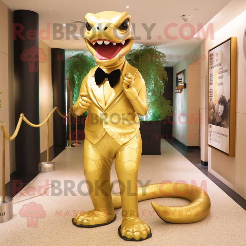 Gold Titanoboa mascot costume character dressed with a Sheath Dress and Bow ties