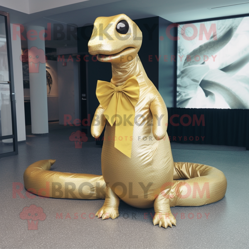 Gold Titanoboa mascot costume character dressed with a Sheath Dress and Bow ties Gold Titanoboa mascot costume character dressed with a Sheath Dress and Bow ties