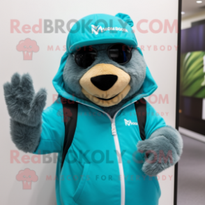 Turquoise Marmot mascot costume character dressed with a Hoodie and Hats