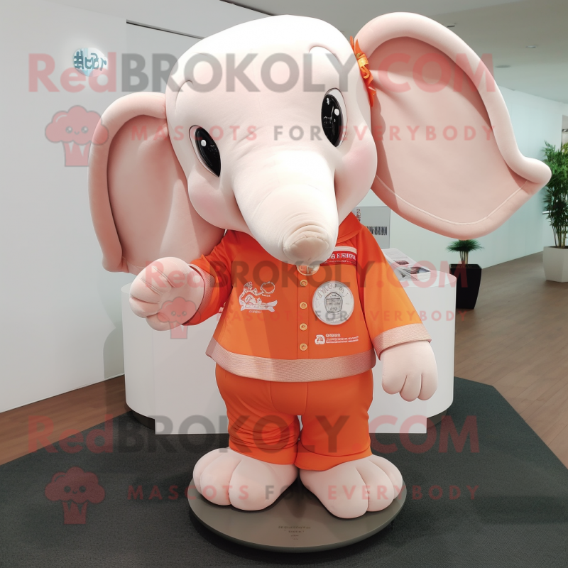 Peach Elephant mascot costume character dressed with a Long Sleeve Tee and Keychains