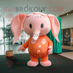 Peach Elephant mascot costume character dressed with a Long Sleeve Tee and Keychains