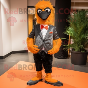 Orange Emu mascot costume character dressed with a Tuxedo and Shoe laces