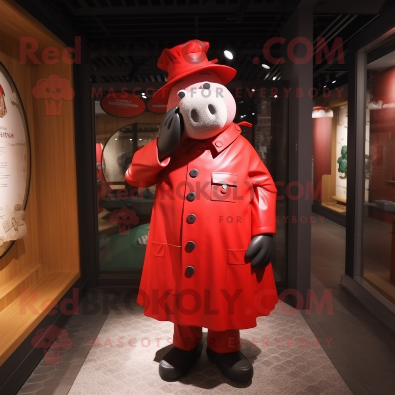 Red Pig mascot costume character dressed with a Raincoat and Berets