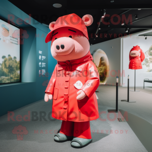Red Pig mascot costume character dressed with a Raincoat and Berets