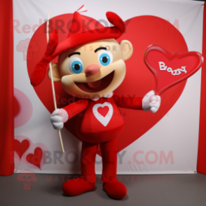 Red Arrow Of Love mascot costume character dressed with a Henley Shirt and Suspenders