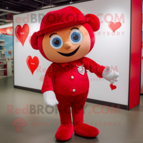 Red Arrow Of Love mascot costume character dressed with a Henley Shirt and Suspenders