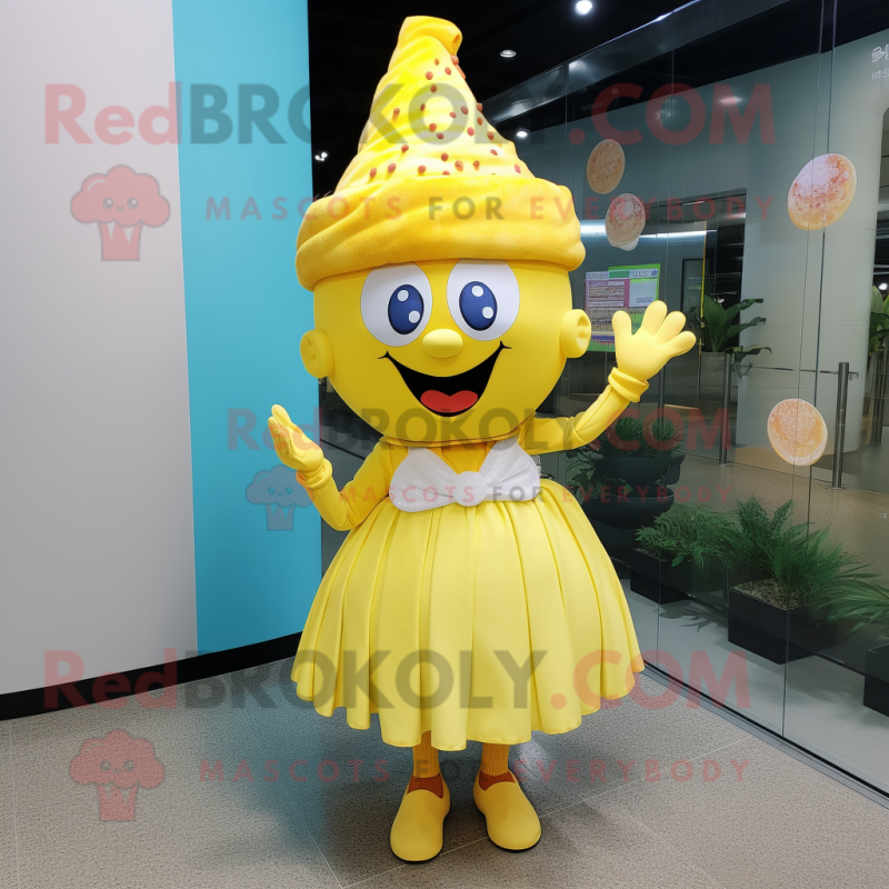 Yellow Cupcake mascot costume character dressed with a Wrap Dress and Hats