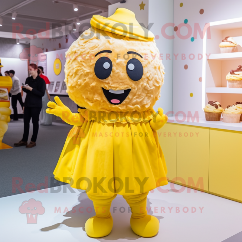 Yellow Cupcake mascot costume character dressed with a Wrap Dress and Hats