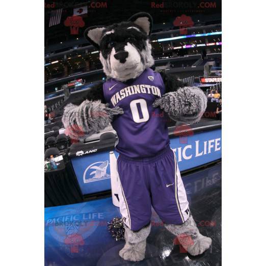 Mascote cachorro preto cinza e branco em roupas esportivas -