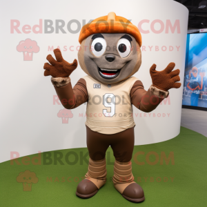 Brown American Football Helmet mascot costume character dressed with a Sweater and Gloves