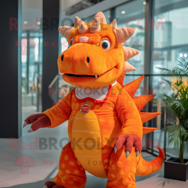 Orange Ankylosaurus mascot costume character dressed with a V-Neck Tee and Hairpins Orange Ankylosaurus mascot costume character dressed with a V-Neck Tee and Hairpins