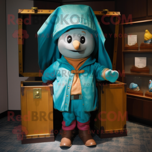 Teal Treasure Chest mascot costume character dressed with a Raincoat and Shawl pins