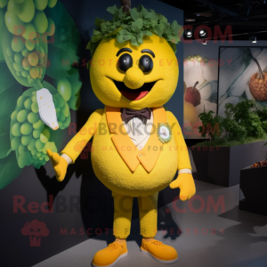 Yellow Grape mascot costume character dressed with a Waistcoat and Hairpins