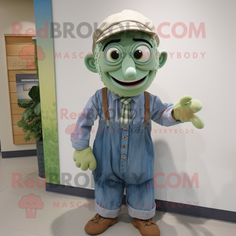 nan Green Bean mascot costume character dressed with a Chambray Shirt and Wraps