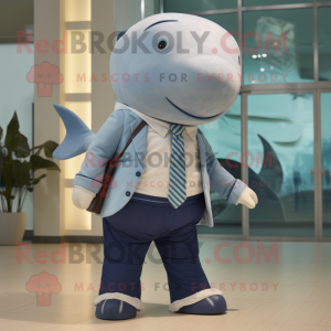 Tan Blue Whale mascot costume character dressed with a Chinos and Ties