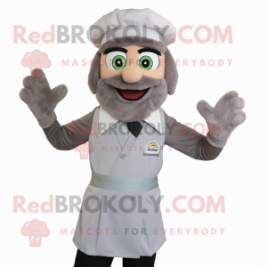 Gray Falafel mascot costume character dressed with a Polo Shirt and Suspenders