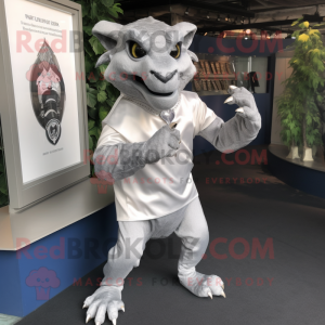 Silver Gargoyle mascot costume character dressed with a Henley Shirt and Pocket squares