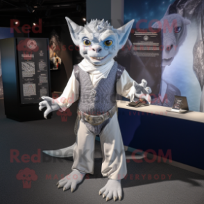 Silver Gargoyle mascot costume character dressed with a Henley Shirt and Pocket squares