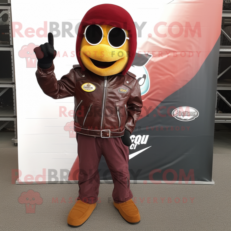 Maroon Currywurst mascot costume character dressed with a Biker Jacket and Shoe clips Maroon Currywurst mascot costume character dressed with a Biker Jacket and Shoe clips