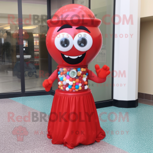 Red Gumball Machine mascot costume character dressed with a Evening Gown and Eyeglasses