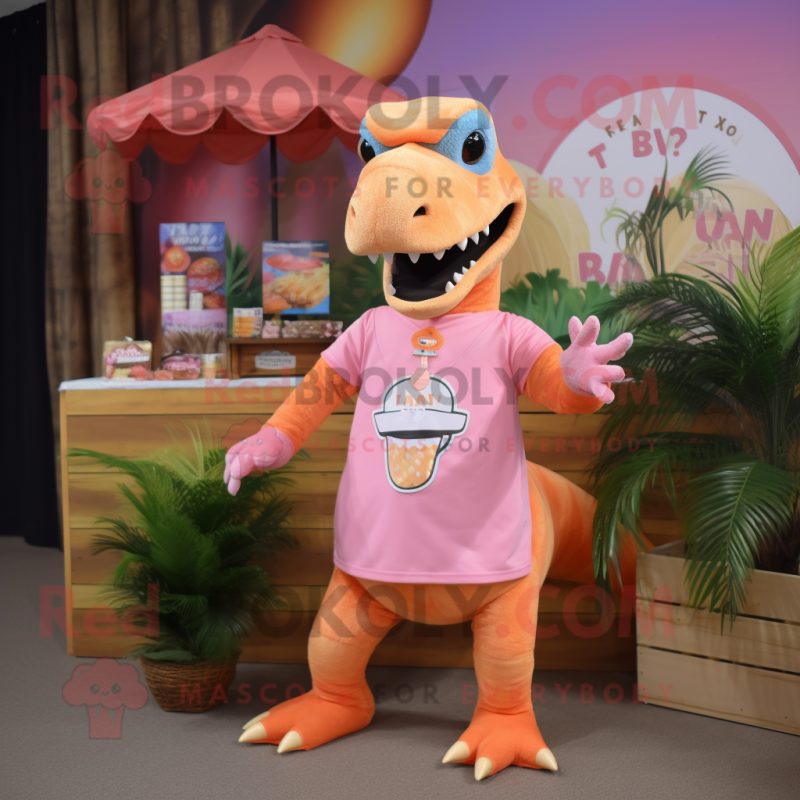 Peach Tyrannosaurus mascot costume character dressed with a T-Shirt and Headbands Peach Tyrannosaurus mascot costume character dressed with a T-Shirt and Headbands