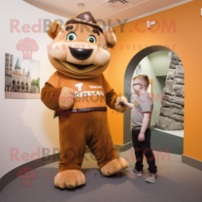 Tan Irish Castle mascot costume character dressed with a T-Shirt and Watches