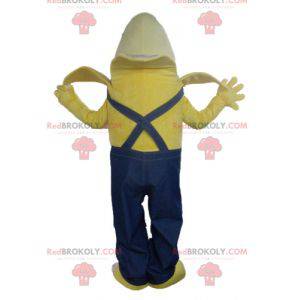 Mascote gigante banana vestido com macacão azul - Redbrokoly.com