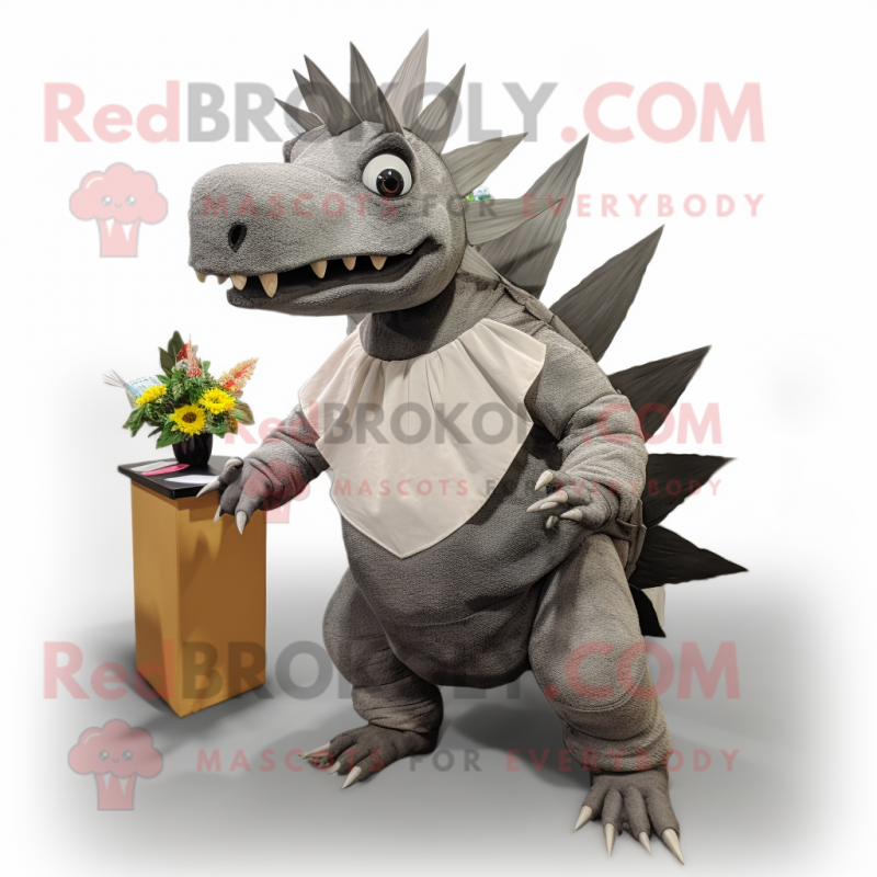 Gray Stegosaurus mascot costume character dressed with a Skirt and Tie pins Gray Stegosaurus mascot costume character dressed with a Skirt and Tie pins